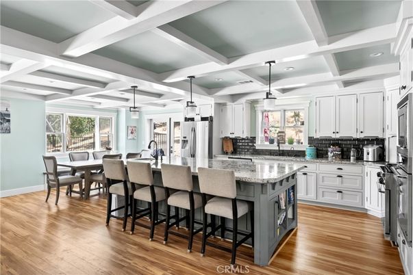 Dining room, Interior, Kitchen, Pendant Lights, Recessed Lighting, Stainless Steel Appliances, Wood Texture Flooring