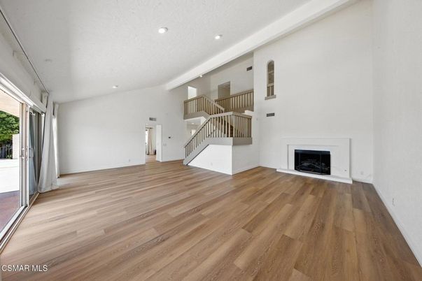 Empty room, Fireplace, Interior, Recessed Lighting, Wood Texture Flooring
