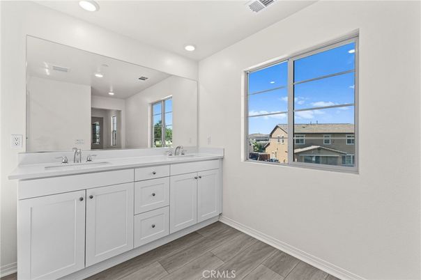 Bathroom, Dual Sink Vanities, Interior, Recessed Lighting, Wood Texture Flooring