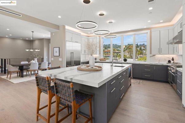 Dining room, Interior, Kitchen, Pendant Lights, Recessed Lighting, Stainless Steel Appliances, Wood Texture Flooring