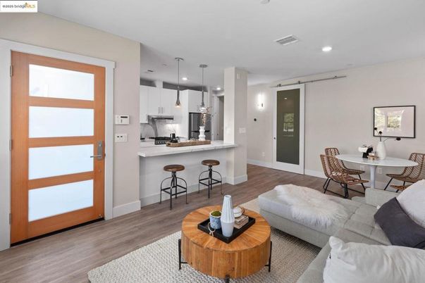 Dining room, Interior, Kitchen, Living room, Pendant Lights, Recessed Lighting, Stainless Steel Appliances, Wood Texture Flooring