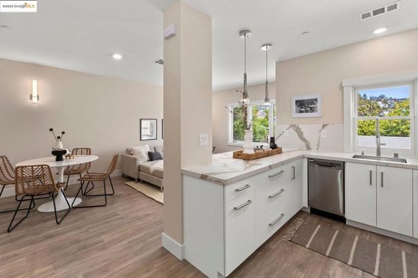 Dining room, Interior, Kitchen, Pendant Lights, Recessed Lighting, Stainless Steel Appliances, Wood Texture Flooring