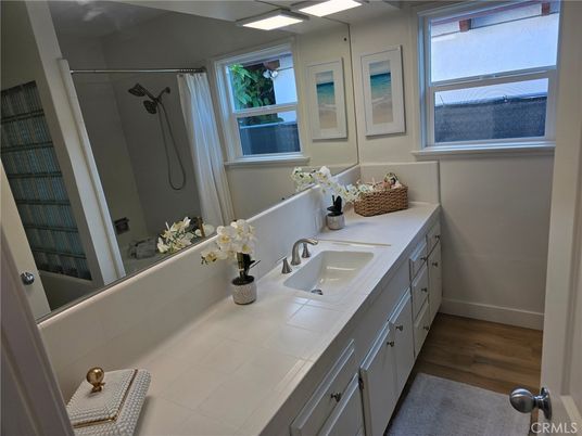 Bathroom, Dual Sink Vanities, Interior, Tile Countertops, Wood Texture Flooring