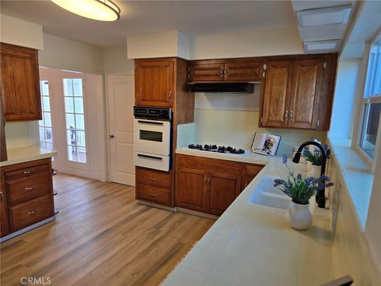Interior, Kitchen, Tile Countertops, Wood Texture Flooring