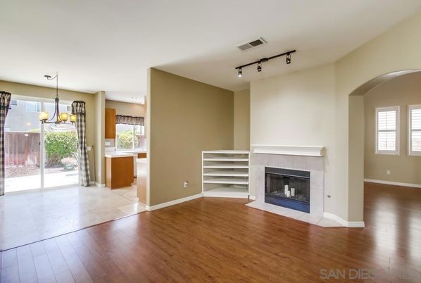 Empty room, Fireplace, Interior, Pendant Lights, Wood Texture Flooring