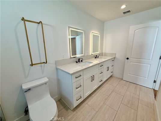 Bathroom, Dual Sink Vanities, Interior, Recessed Lighting, Wood Texture Flooring