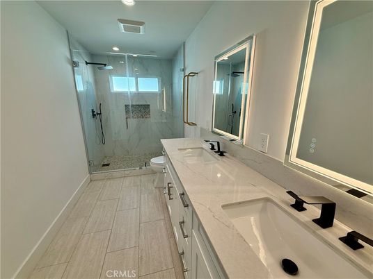 Bathroom, Dual Sink Vanities, Glass Shower, Interior, Marble Walls, Recessed Lighting