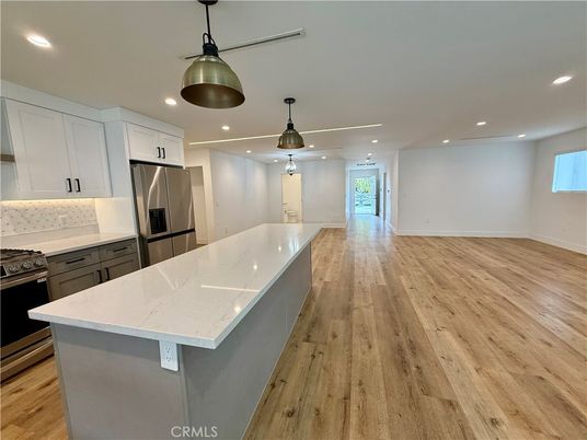 Interior, Kitchen, Pendant Lights, Recessed Lighting, Stainless Steel Appliances, Wood Texture Flooring