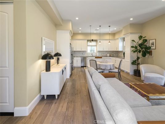 Dining room, Interior, Kitchen, Living room, Pendant Lights, Recessed Lighting, Stainless Steel Appliances, Wood Texture Flooring