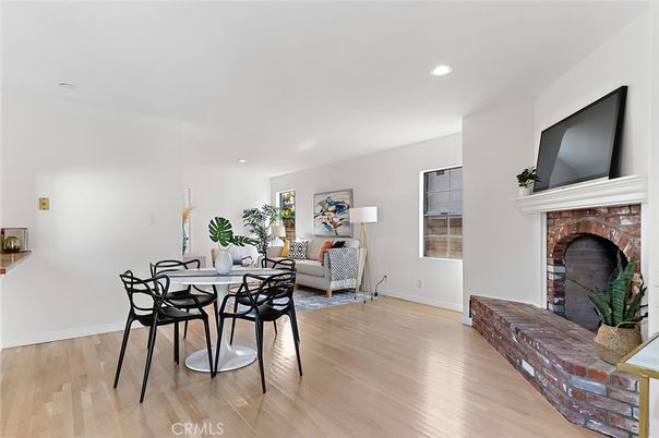 Dining room, Fireplace, Interior, Living room, Recessed Lighting, Wood Texture Flooring