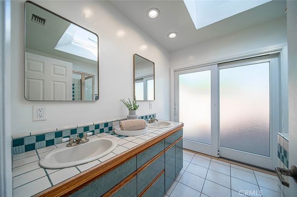 Bathroom, Dual Sink Vanities, Interior, Recessed Lighting, Tile Countertops