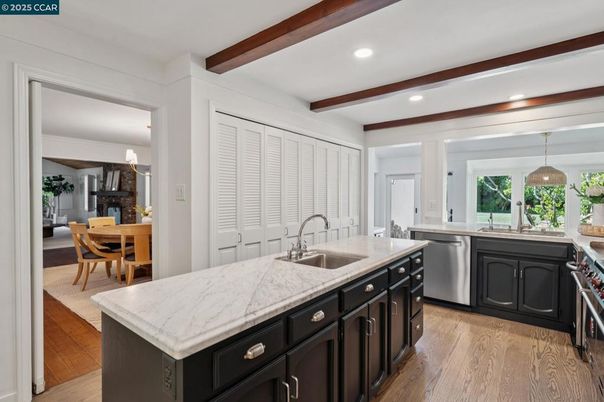 Dining room, Interior, Kitchen, Pendant Lights, Recessed Lighting, Stainless Steel Appliances, Wooden Beams, Wood Texture Flooring