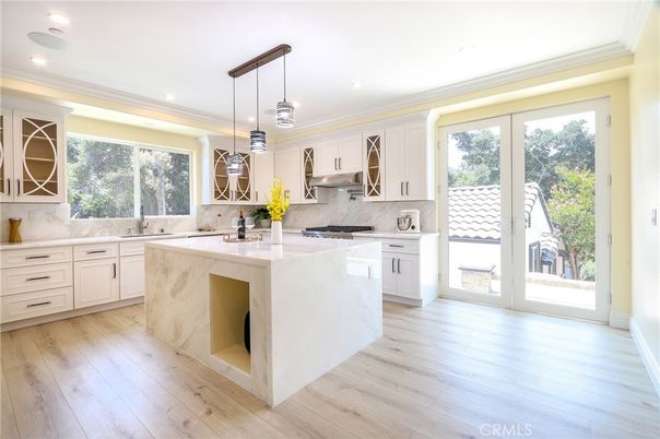 Interior, Kitchen, Marble Walls, Pendant Lights, Recessed Lighting, Wood Texture Flooring