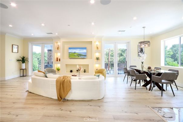 Dining room, Fireplace, Interior, Living room, Pendant Lights, Recessed Lighting, Wood Texture Flooring