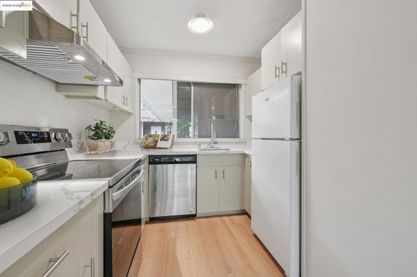 Interior, Kitchen, Recessed Lighting, Stainless Steel Appliances, Wood Texture Flooring