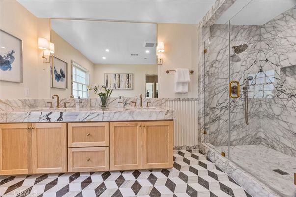 Bathroom, Dual Sink Vanities, Glass Shower, Interior, Marble Walls, Recessed Lighting