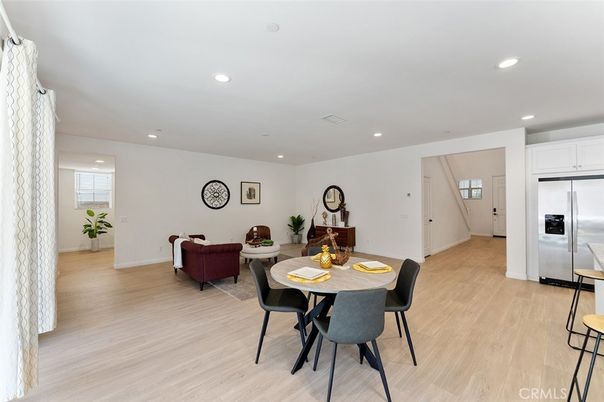 Dining room, Interior, Kitchen, Living room, Recessed Lighting, Stainless Steel Appliances, Wood Texture Flooring
