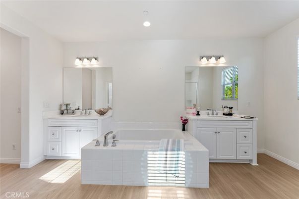 Bathroom, Dual Sink Vanities, Interior, Recessed Lighting, Wood Texture Flooring