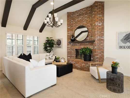 Chandelier, Fireplace, Interior, Living room, Recessed Lighting, Stone Walls, Wooden Beams