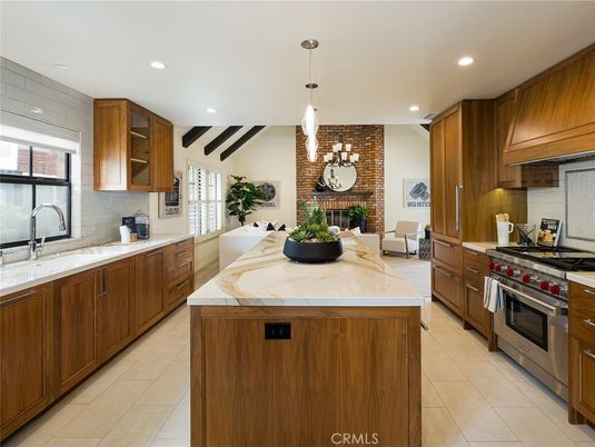Fireplace, Interior, Kitchen, Pendant Lights, Recessed Lighting, Stainless Steel Appliances, Stone Walls, Wooden Beams