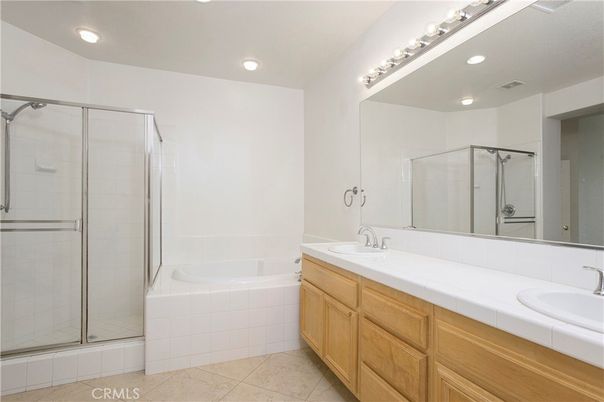 Bathroom, Dual Sink Vanities, Glass Shower, Interior, Recessed Lighting, Tile Countertops