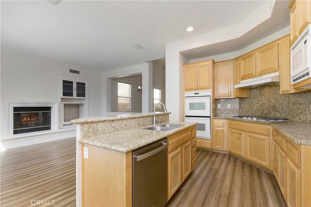 Fireplace, Interior, Kitchen, Recessed Lighting, Wood Texture Flooring