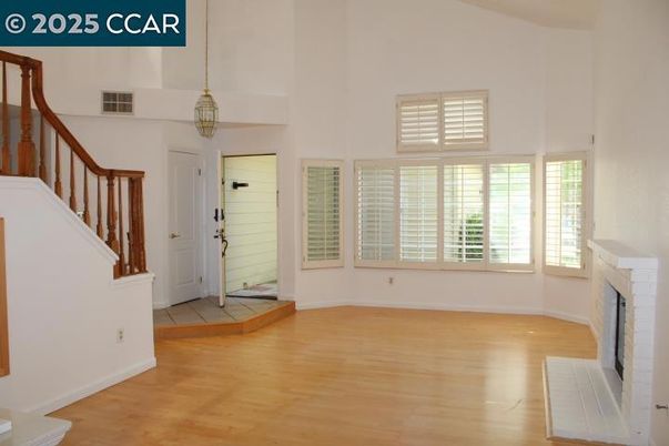 Empty room, Fireplace, Interior, Pendant Lights, Wood Texture Flooring