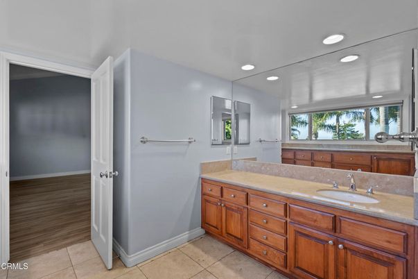 Bathroom, Dual Sink Vanities, Interior, Recessed Lighting, Wood Texture Flooring