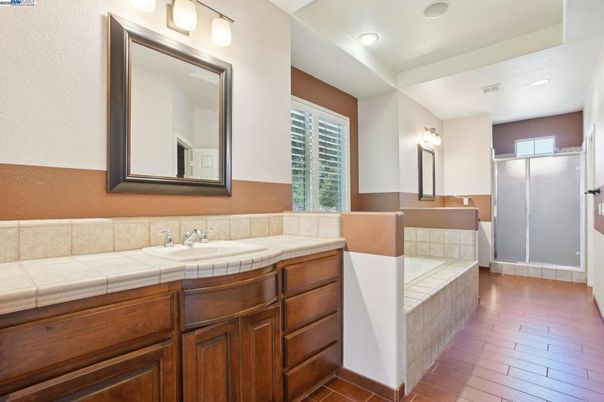 Bathroom, Interior, Recessed Lighting, Tile Countertops, Wood Texture Flooring