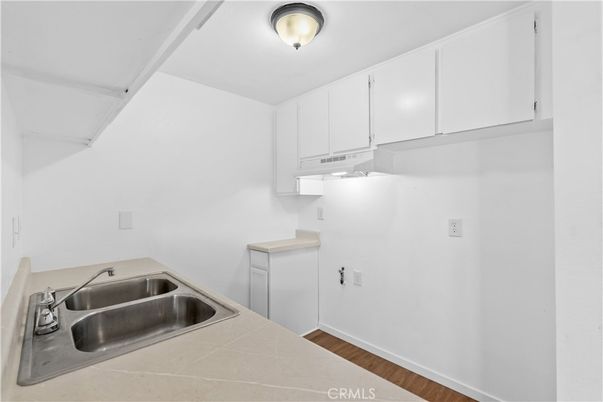 Interior, Kitchen, Tile Countertops, Wood Texture Flooring