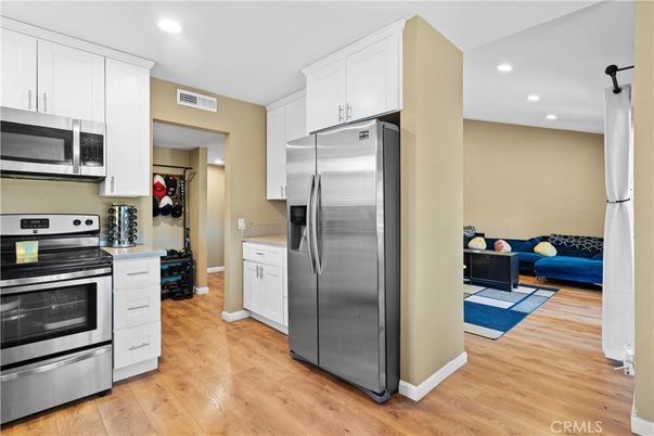 Interior, Kitchen, Recessed Lighting, Stainless Steel Appliances, Wood Texture Flooring