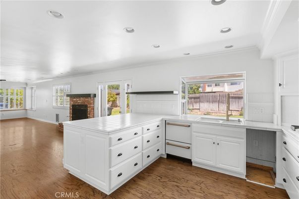 Fireplace, Interior, Kitchen, Recessed Lighting, Wood Texture Flooring