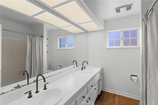 Bathroom, Dual Sink Vanities, Interior, Tile Countertops, Wood Texture Flooring