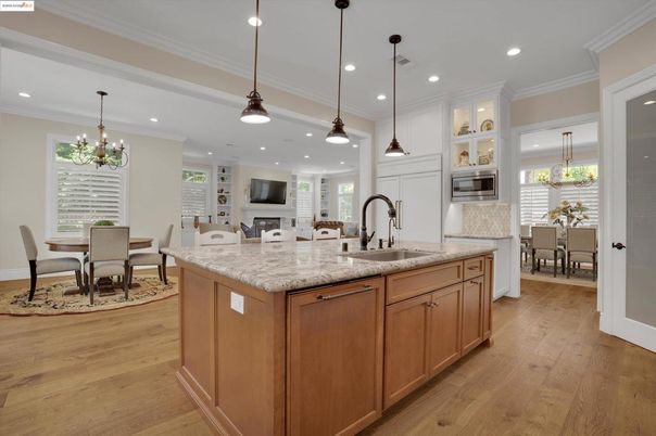 Chandelier, Dining room, Fireplace, Interior, Kitchen, Pendant Lights, Recessed Lighting, Wood Texture Flooring