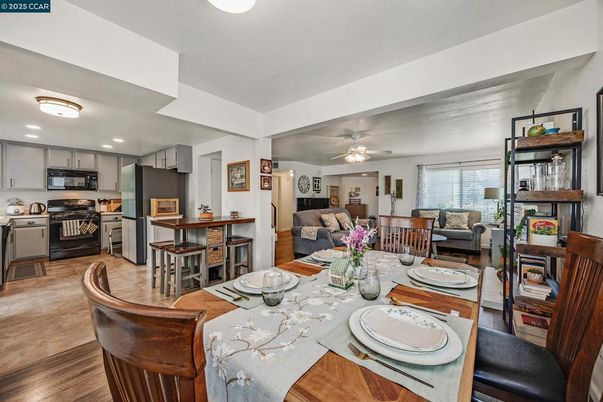 Dining room, Interior, Kitchen, Living room, Recessed Lighting, Stainless Steel Appliances, Wood Texture Flooring