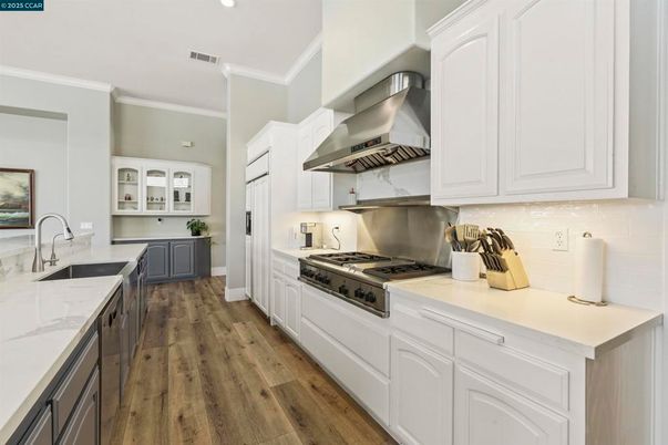 Interior, Kitchen, Recessed Lighting, Stainless Steel Appliances, Wood Texture Flooring