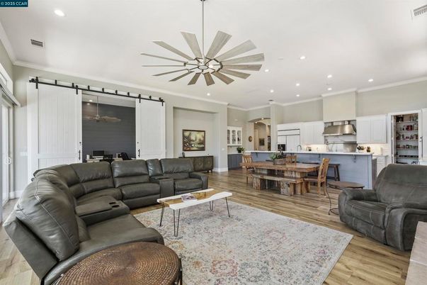 Dining room, Interior, Kitchen, Living room, Pendant Lights, Recessed Lighting, Stainless Steel Appliances, Wood Texture Flooring
