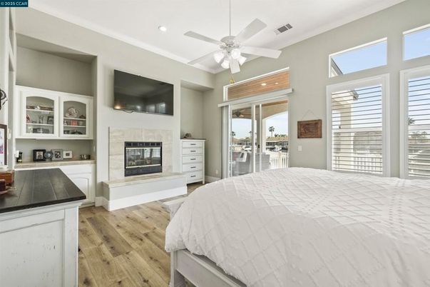 Bedroom, Fireplace, Interior, Recessed Lighting, Wood Texture Flooring