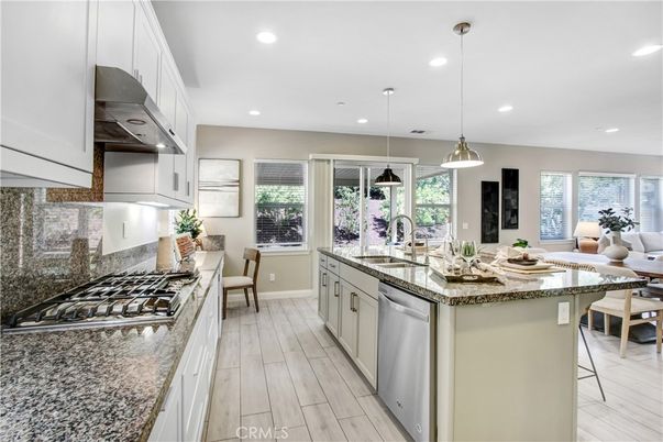 Dining room, Interior, Kitchen, Living room, Pendant Lights, Recessed Lighting, Stainless Steel Appliances, Wood Texture Flooring