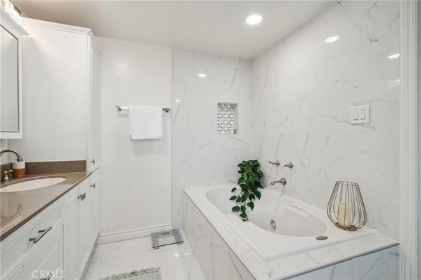 Bathroom, Dual Sink Vanities, Interior, Marble, Marble Walls, Recessed Lighting