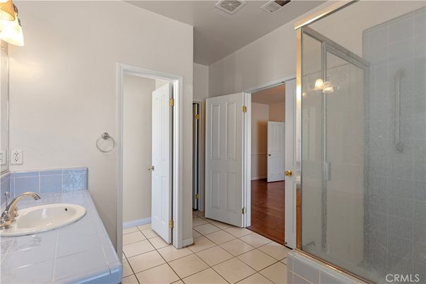 Bathroom, Glass Shower, Interior, Tile Countertops, Wood Texture Flooring