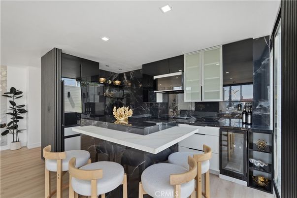 Interior, Kitchen, Marble Walls, Recessed Lighting, Wood Texture Flooring
