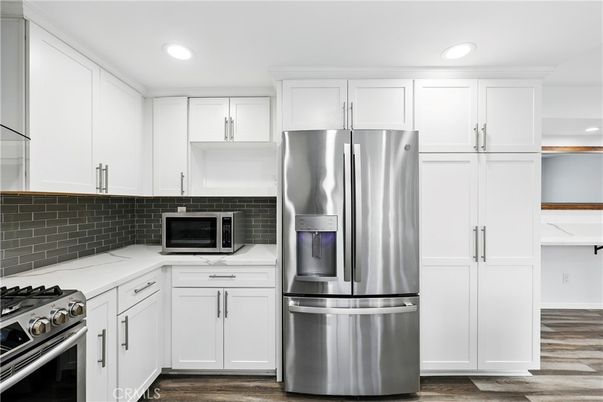 Interior, Kitchen, Recessed Lighting, Stainless Steel Appliances, Wood Texture Flooring