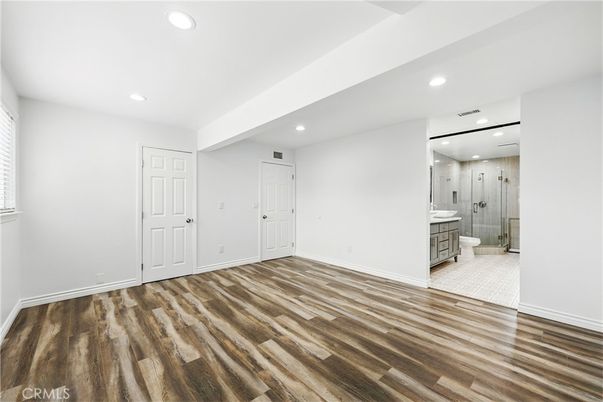 Bathroom, Empty room, Glass Shower, Interior, Recessed Lighting, Wood Texture Flooring