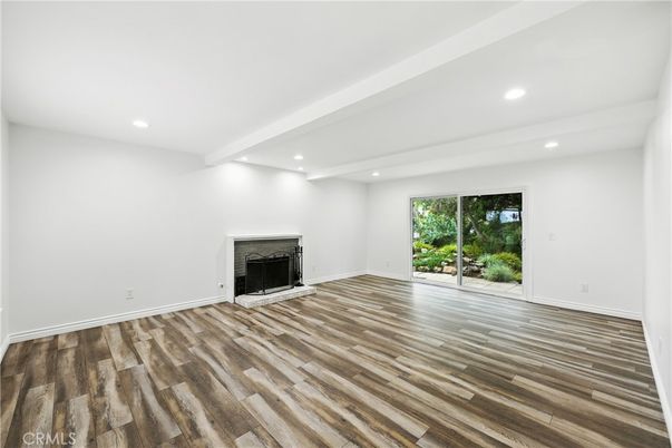 Empty room, Fireplace, Interior, Recessed Lighting, Wood Texture Flooring