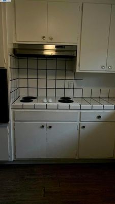 Interior, Kitchen, Tile Countertops, Wood Texture Flooring