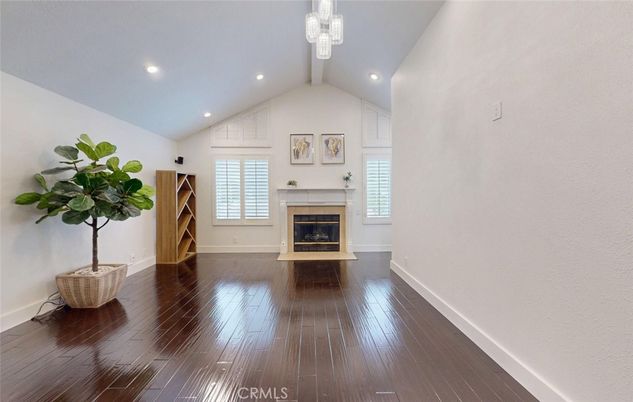 Chandelier, Empty room, Fireplace, Interior, Recessed Lighting, Wood Texture Flooring