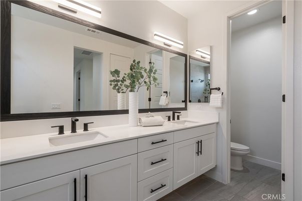 Bathroom, Dual Sink Vanities, Interior, Recessed Lighting, Wood Texture Flooring