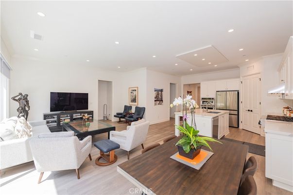 Dining room, Interior, Kitchen, Living room, Recessed Lighting, Stainless Steel Appliances, Wood Texture Flooring