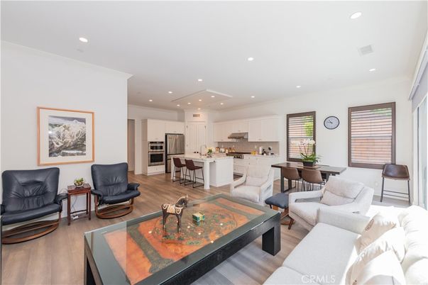 Dining room, Interior, Kitchen, Living room, Recessed Lighting, Stainless Steel Appliances, Wood Texture Flooring